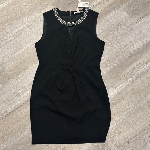 Forever 21 Dresses & Skirts - Forever 21 Black Mini Dress with Embellished Neckline